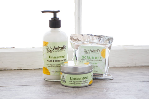 Collection of unscented items: lotion, scrub bee, and body butter