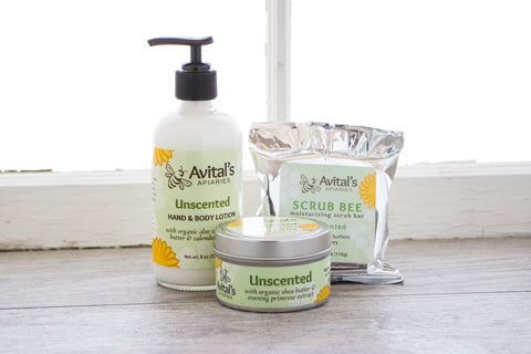 Collection of unscented items: lotion, scrub bee, and body butter